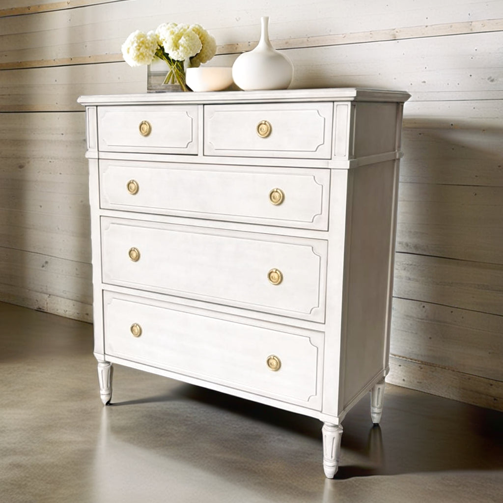 French vintage-style wood dresser with three drawers and brass knobs